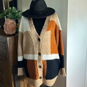 LUSH brand size small also fits medium multi brown sweater